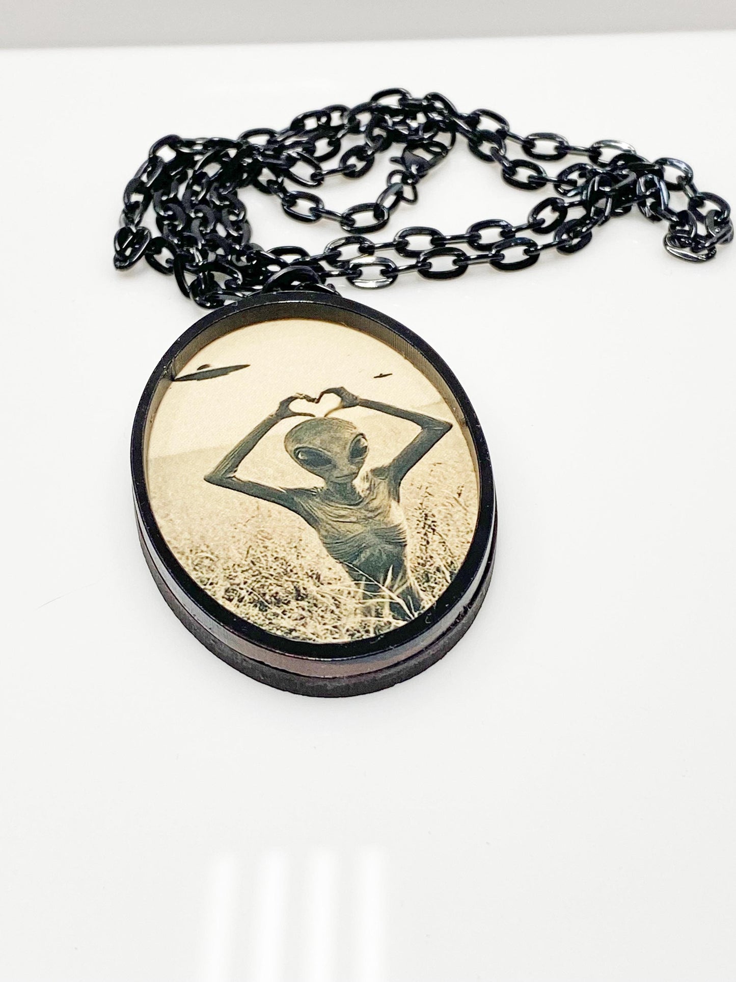 Retro Alien Necklace | We Come in Peace ~ UFO & Space Lover Jewelry | Laser Cut Sublimated Wood | 24” Black Chain | Sci-Fi Statement Pendant