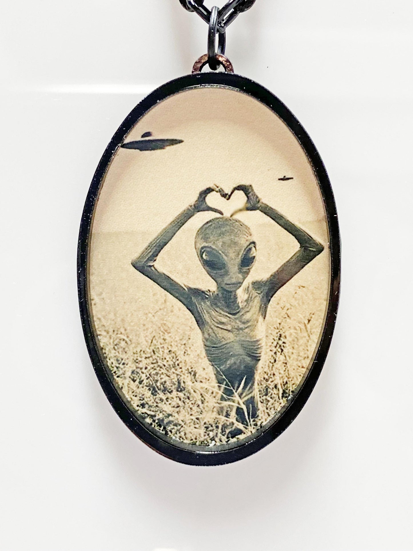 Retro Alien Necklace | We Come in Peace ~ UFO & Space Lover Jewelry | Laser Cut Sublimated Wood | 24” Black Chain | Sci-Fi Statement Pendant