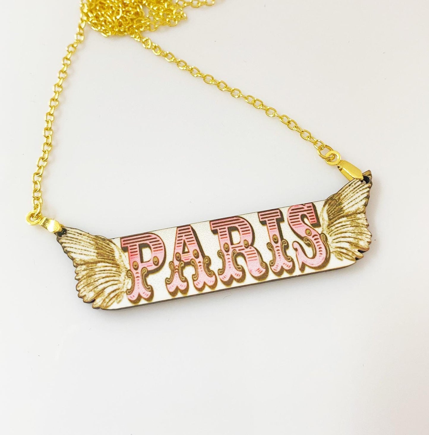 Paris Winged Necklace – Handmade Vintage-Inspired Wooden Pendant with Gold Chain – Sublimated for Durability