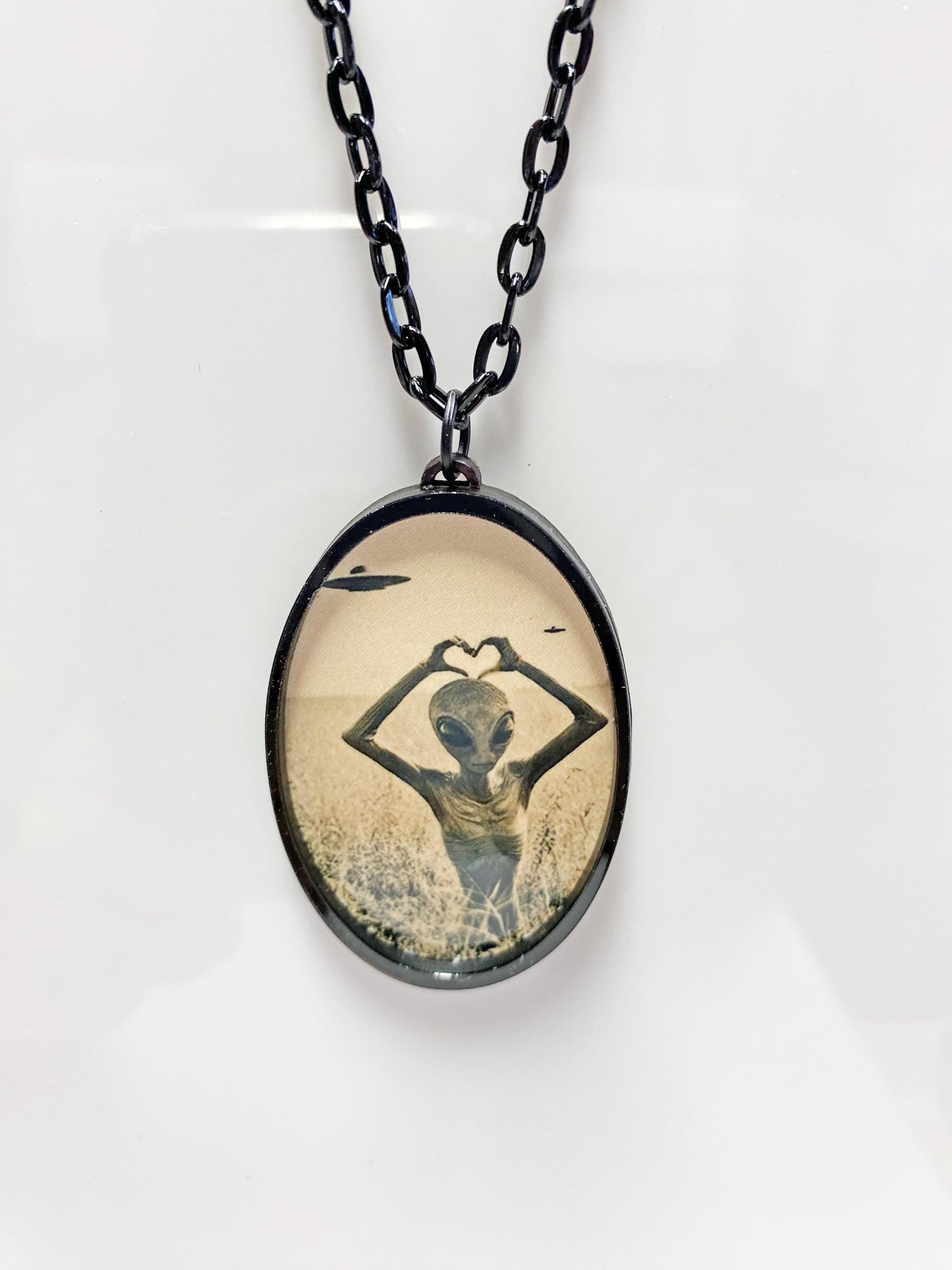 Retro Alien Necklace | We Come in Peace ~ UFO & Space Lover Jewelry | Laser Cut Sublimated Wood | 24” Black Chain | Sci-Fi Statement Pendant