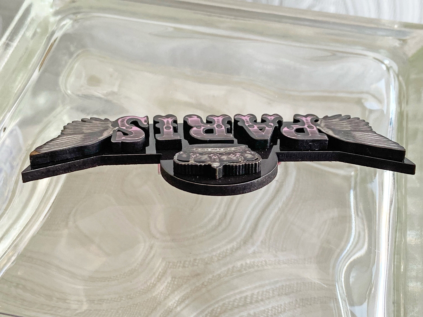 Beautiful Paris Handcrafted Brooch ~ Pink and Black ~ The Letters of Paris are articulated in laser-cut wood with sublimated images.