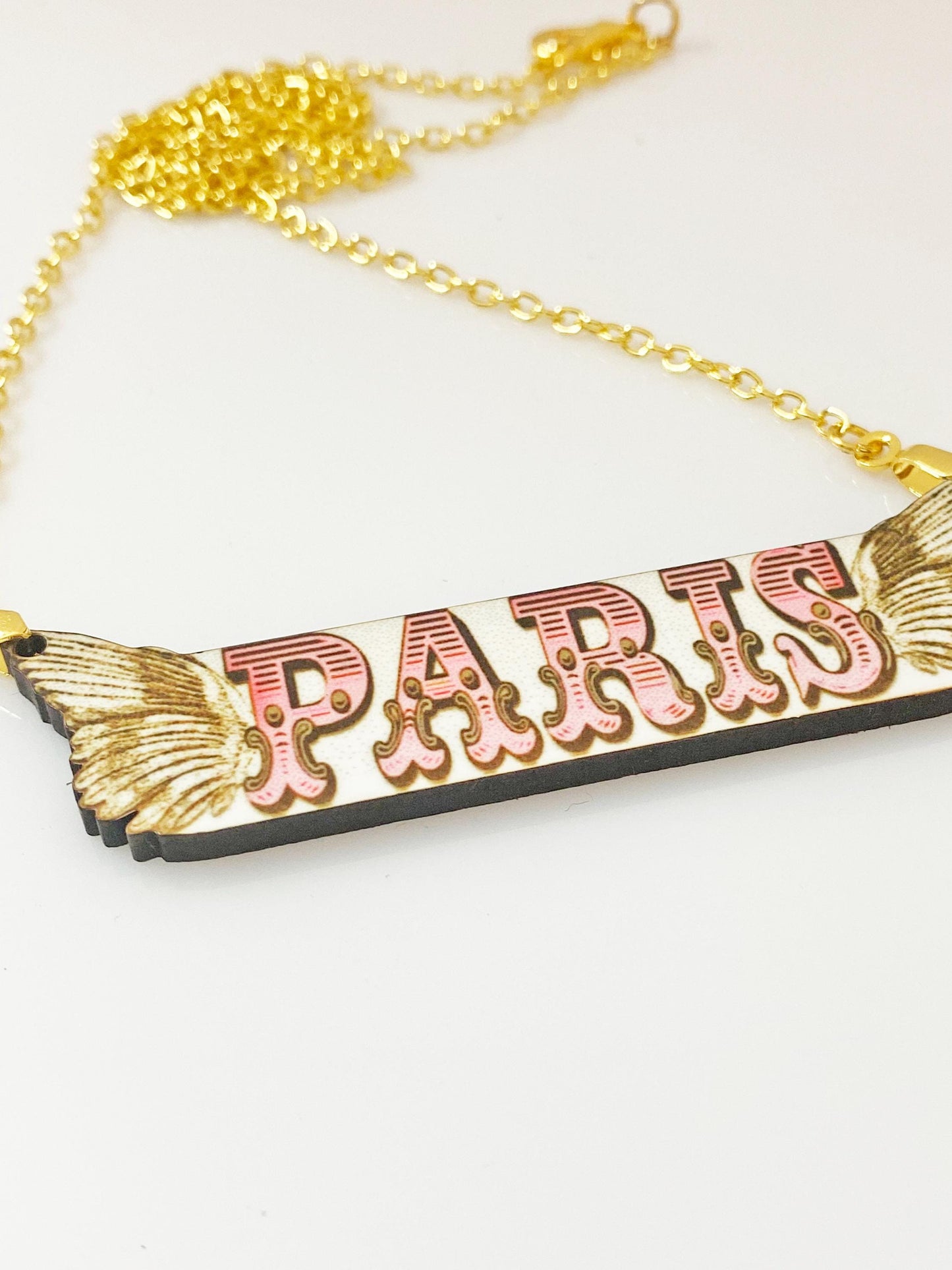 Paris Winged Necklace – Handmade Vintage-Inspired Wooden Pendant with Gold Chain – Sublimated for Durability