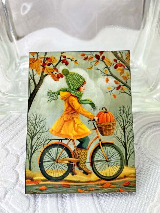 Lovely Fall Scene Illustrated Brooch / Pin ~ Girl Bike Riding with Pumpkin in Basket, Fall Colors & Theme ~ Laser Cut Wood, Sublimated Image