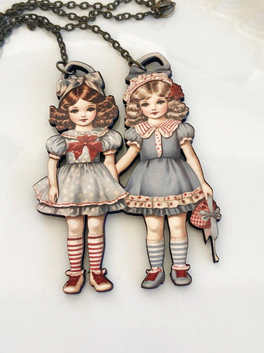 Adorable Twins or Girl Friends Necklace ~ Vintage Look, Blues and reds ~ Wearable Art ~ Laser Cut Wood, Sublimated Illustration