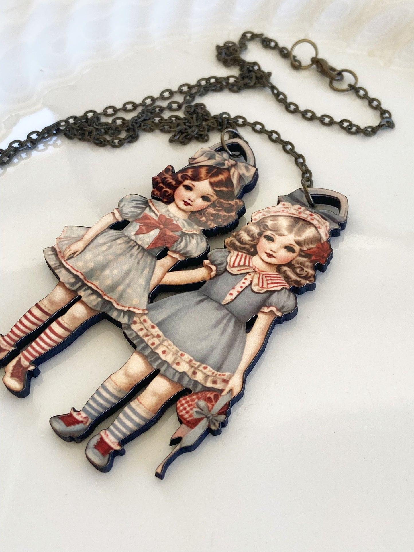 Adorable Twins or Girl Friends Necklace ~ Vintage Look, Blues and reds ~ Wearable Art ~ Laser Cut Wood, Sublimated Illustration